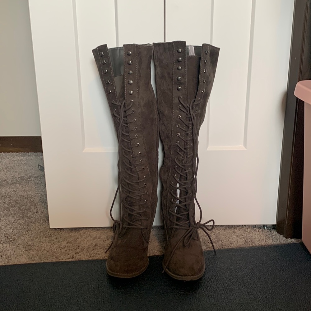 Knee high lace up boots